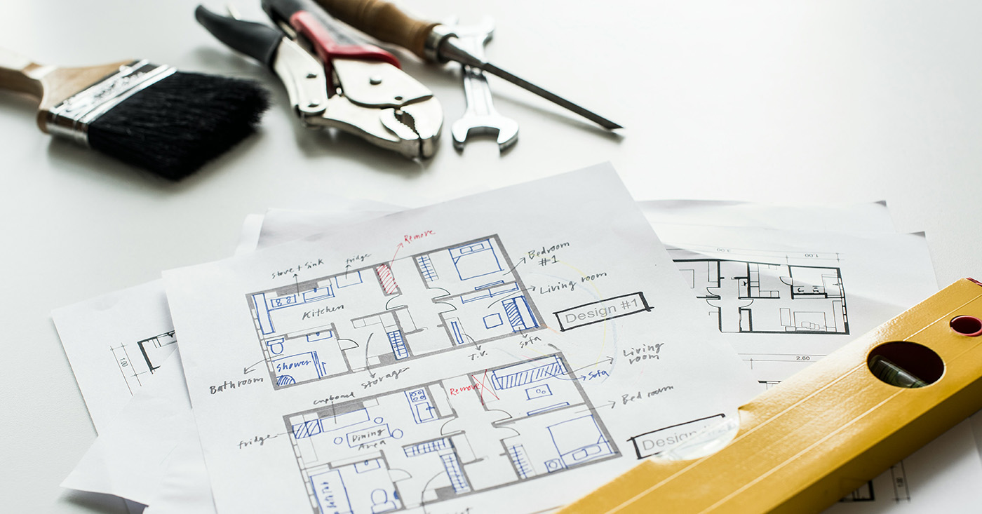 A workstation of a building renovation or design planning, with a focus on floor plan layouts.